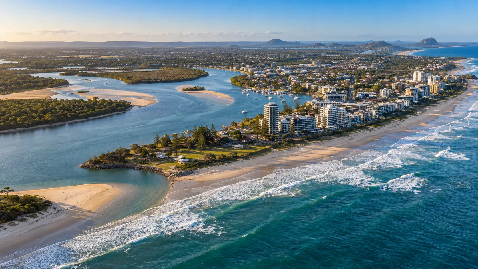 Aerial view across Maroochydore Beach, Cotton Tree and the Maroochy River mouth